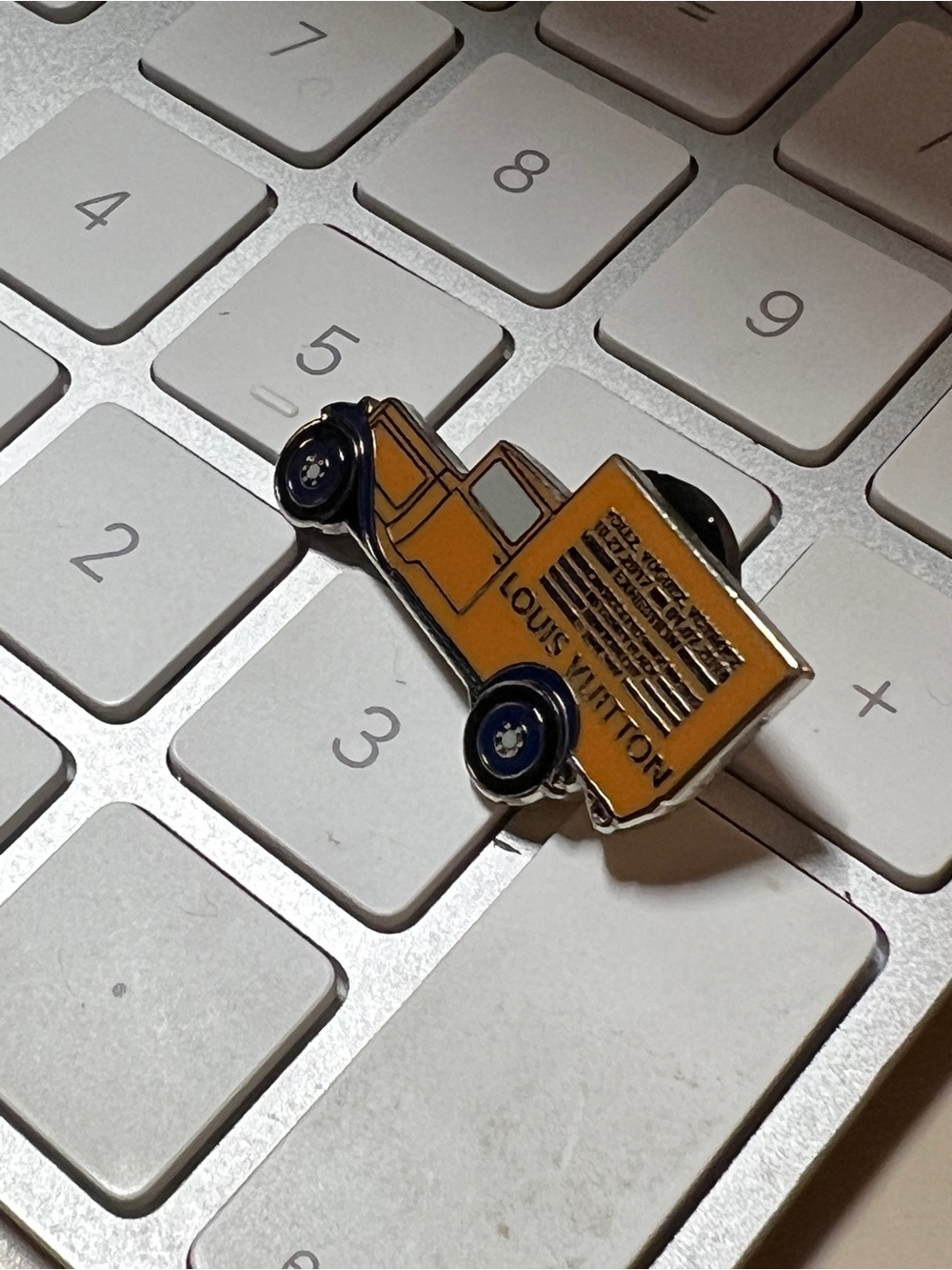 Louis Vuitton Yellow and Blue Truck Enamel Pin